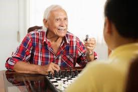 Homebound Friends Man Playing a Board Game.